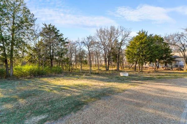 Tbd Lakeview Trail Mabank, TX 75147 - Photo 8 of 18 a view of a yard with large trees