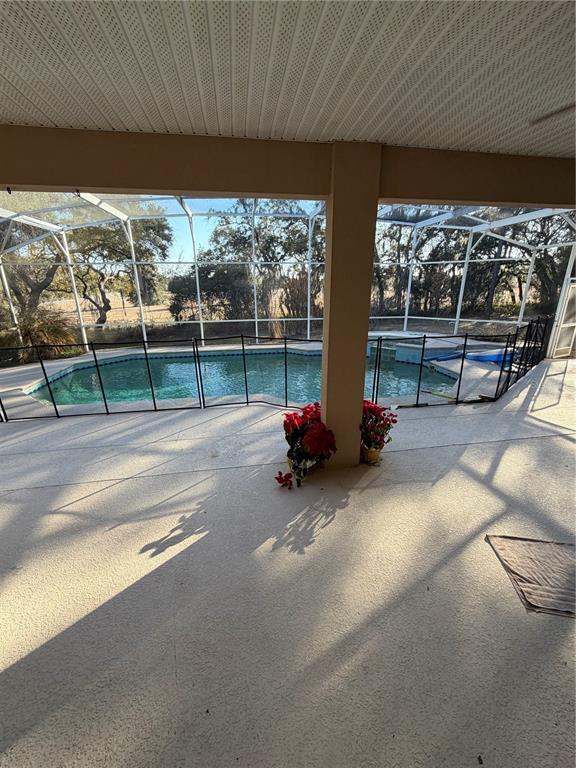 218 Piney Woods Road Apopka, FL 32703 - Photo 5 of 11 a view of swimming pool with outdoor seating