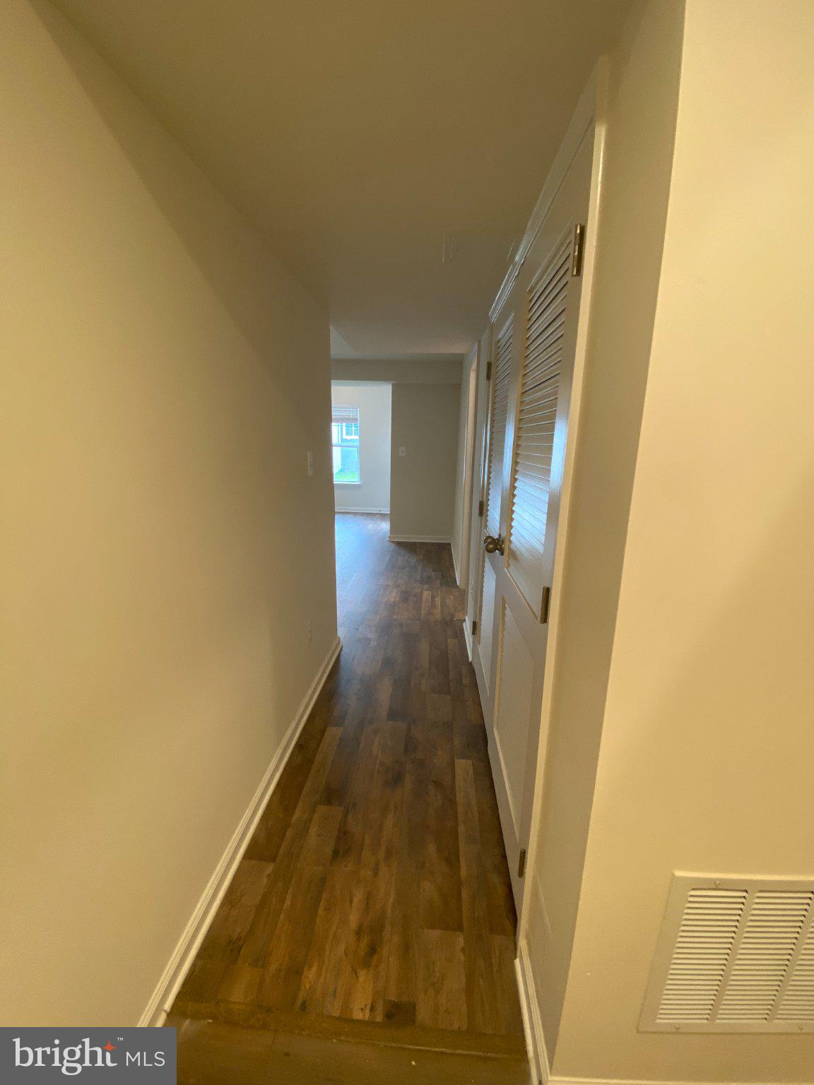 128 Tuxford Road Falling Waters, WV 25419 - Photo 8 of 27 Inviting hallway with warm tones.