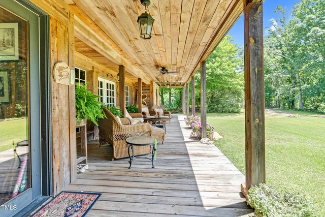 a view of a balcony with chairs