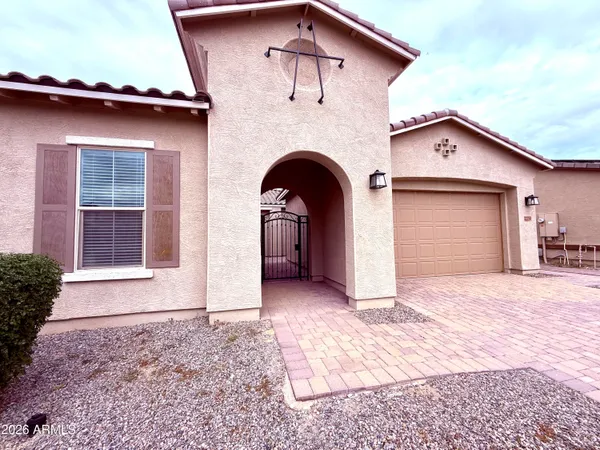 a view of a house with a yard and garage