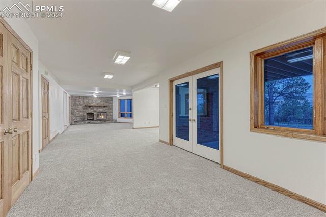 14645 Sterling Road Colorado Springs, CO 80921 - Photo 37 of 49 Step out to one of several outdoor living spaces; the covered patio is great for year round enjoyment