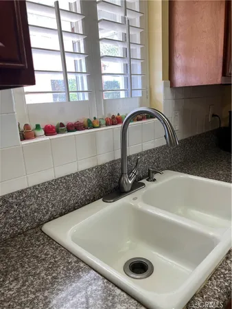 a utility room with washer and dryer