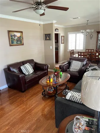 a view of a bedroom with a bed and a window