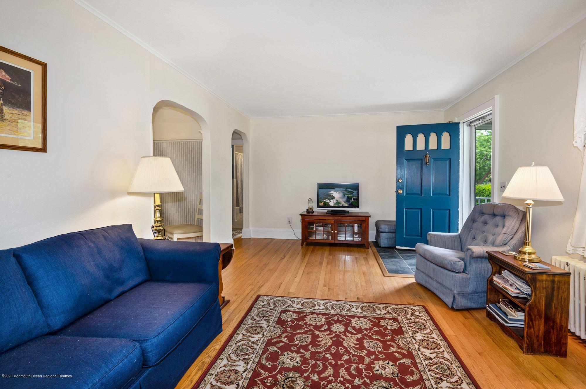 306 Cedar Road Point Pleasant, NJ 08742 - Photo 2 of 28 a living room with furniture and a couch
