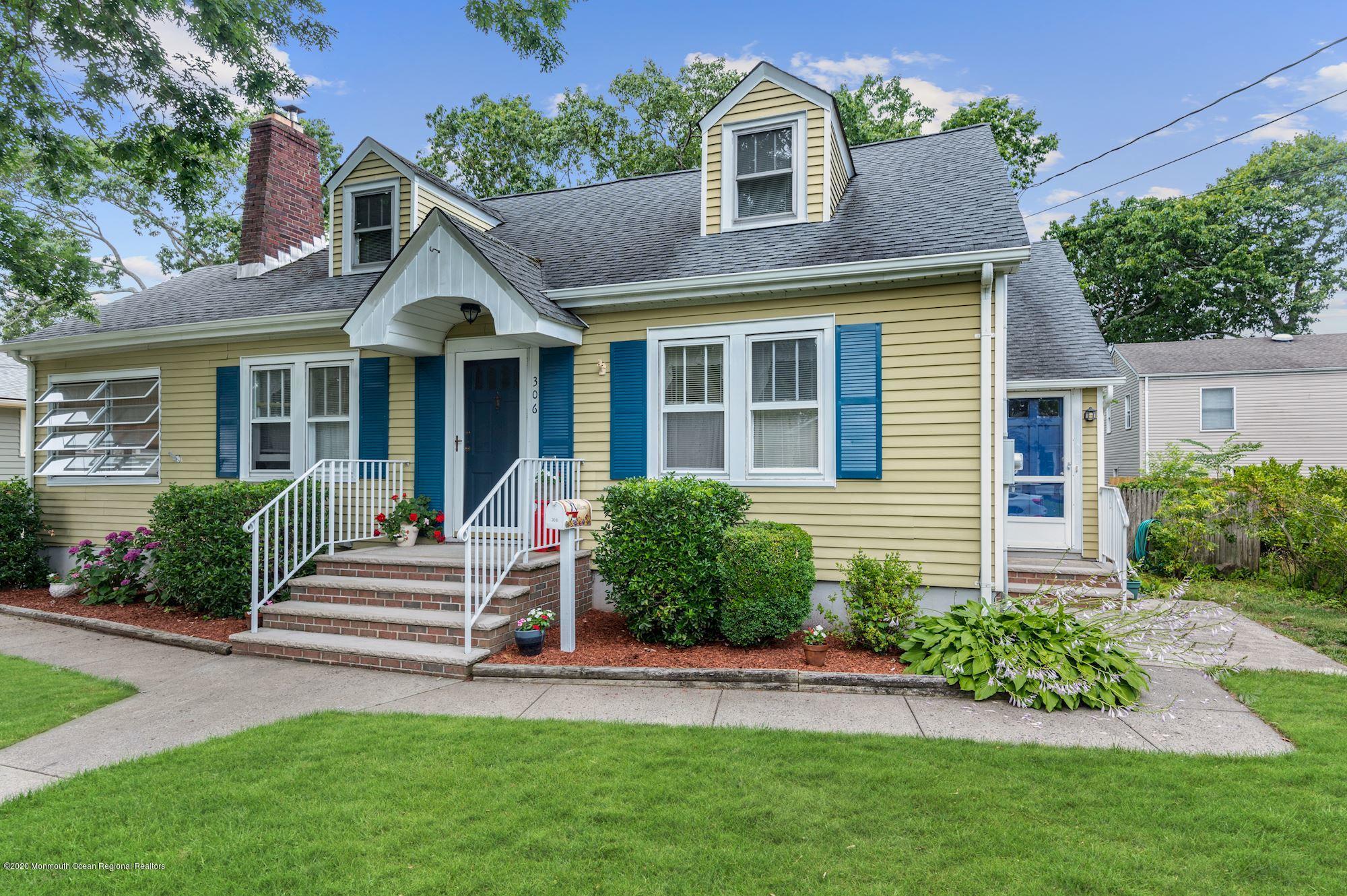 306 Cedar Road Point Pleasant, NJ 08742 - Photo 26 of 28 a front view of a house with a yard