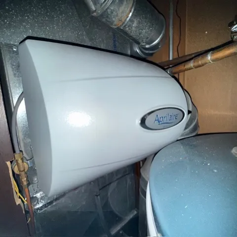 wooden floor in a hall with an entryway