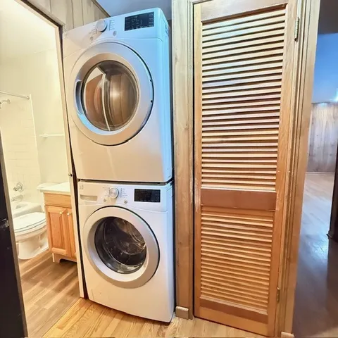 a view of a hallway with washer and dryer