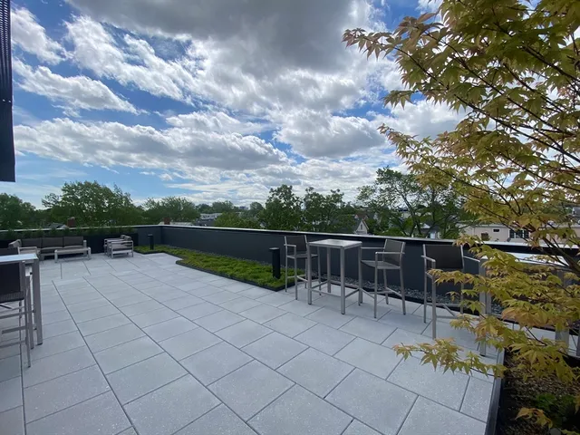 a view of a garden with patio