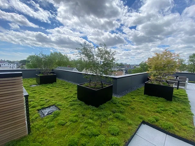 a view of a terrace with sitting area