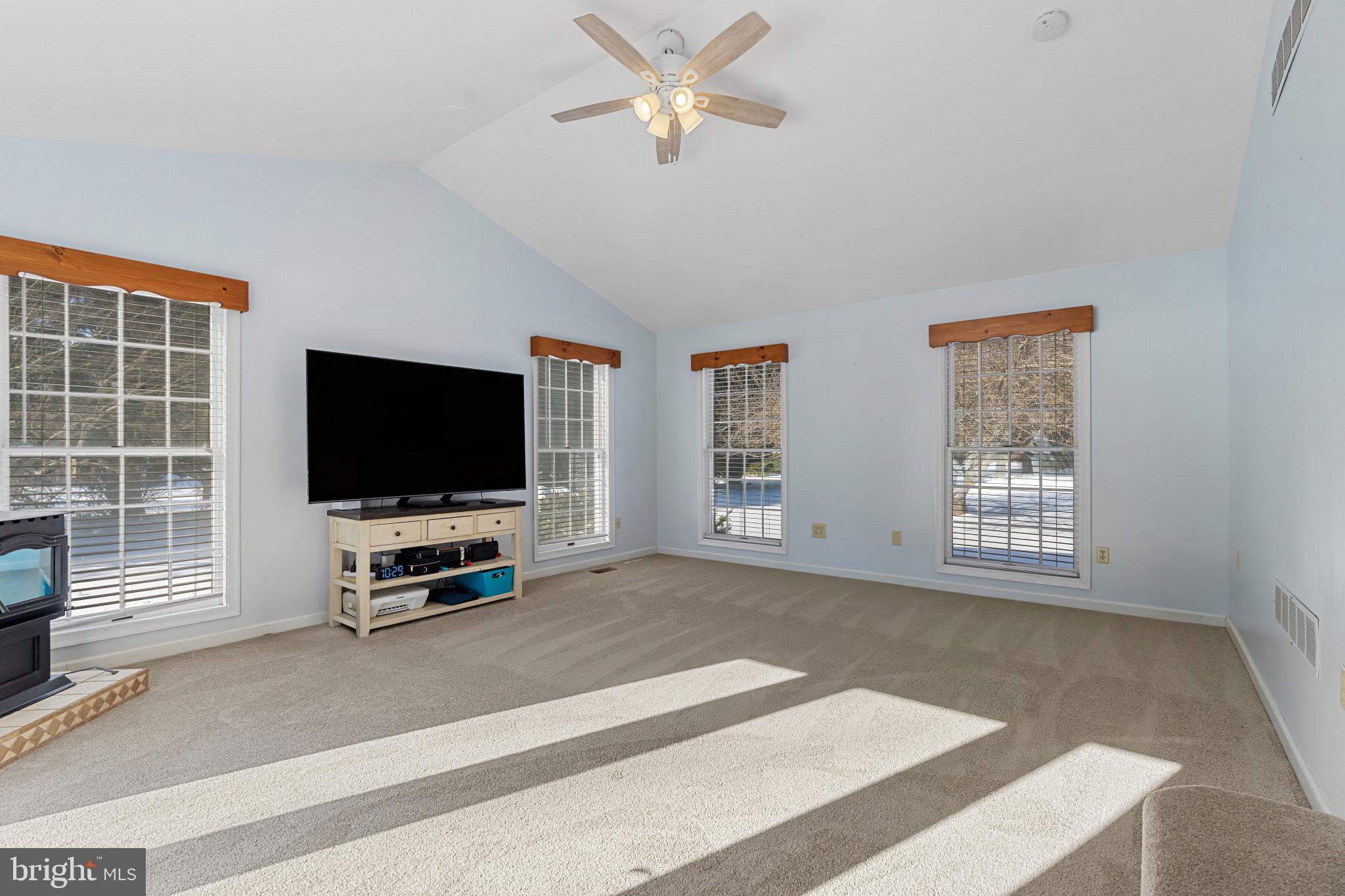 14525 John Peel Road Galena, MD 21635 - Photo 12 of 31 a living room with furniture and a flat screen tv