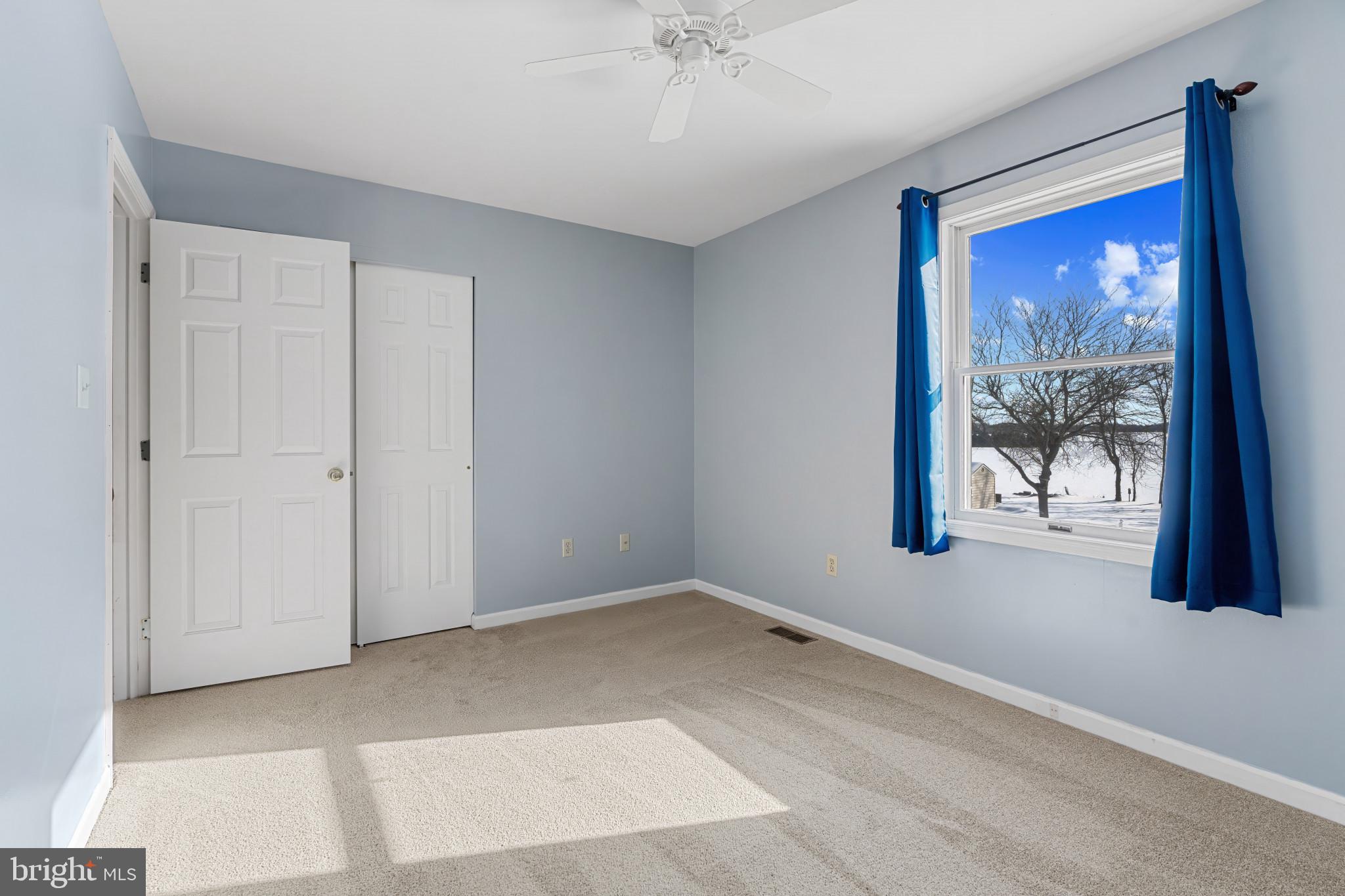 14525 John Peel Road Galena, MD 21635 - Photo 23 of 31 a view of a livingroom with a piano and wooden floor
