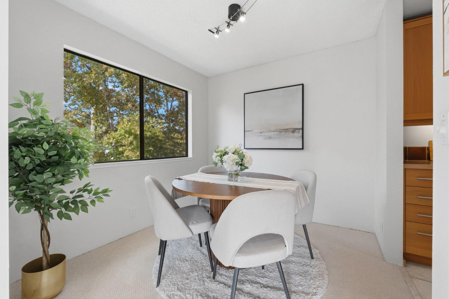765 San Antonio Road, Unit 88 Palo Alto, CA 94303 - Photo 13 of 41 a dining room with furniture and window