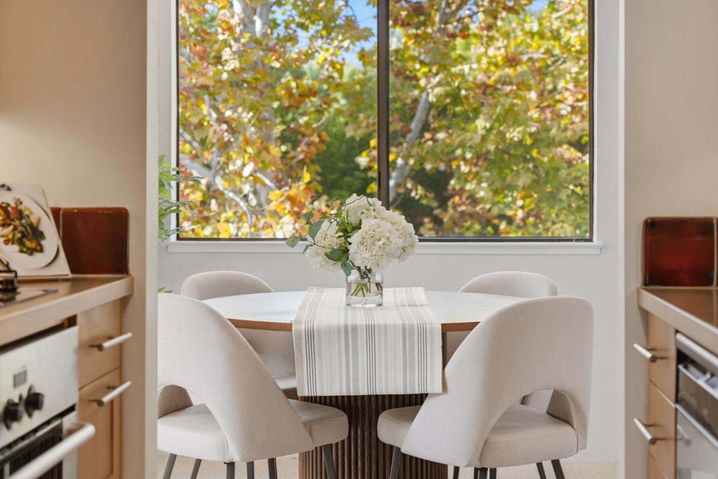 765 San Antonio Road, Unit 88 Palo Alto, CA 94303 - Photo 15 of 41 a view of a dining room with furniture and wooden floor