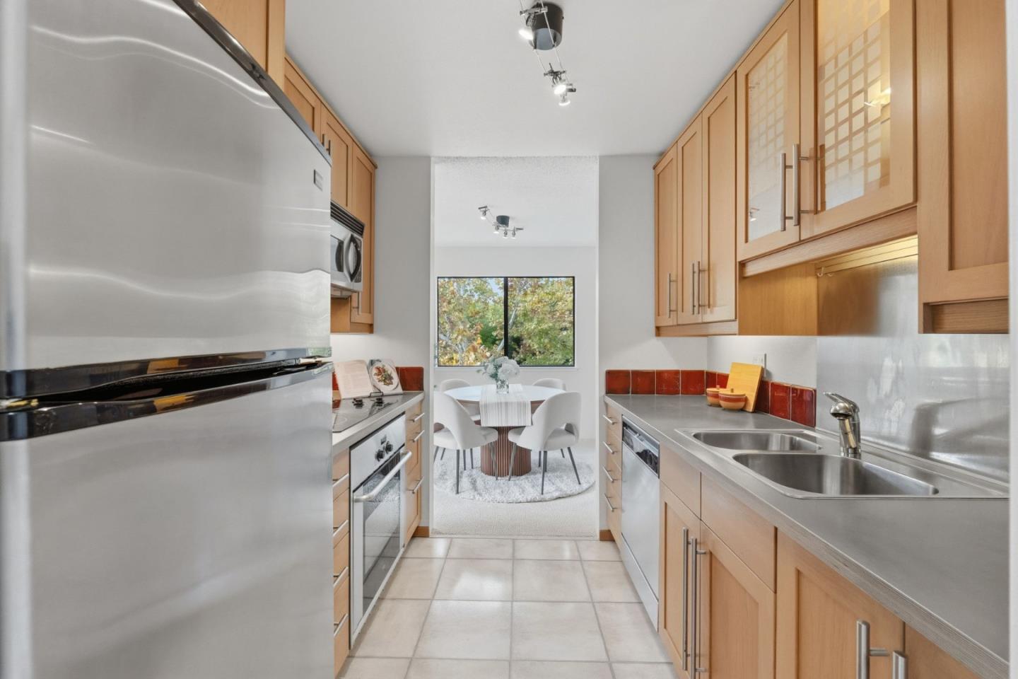 765 San Antonio Road, Unit 88 Palo Alto, CA 94303 - Photo 20 of 41 a kitchen with a sink stove and cabinets