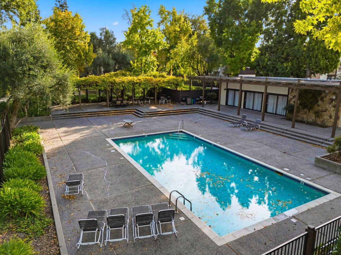 765 San Antonio Road, Unit 88 Palo Alto, CA 94303 - Photo 36 of 41 a view of a swimming pool with a patio