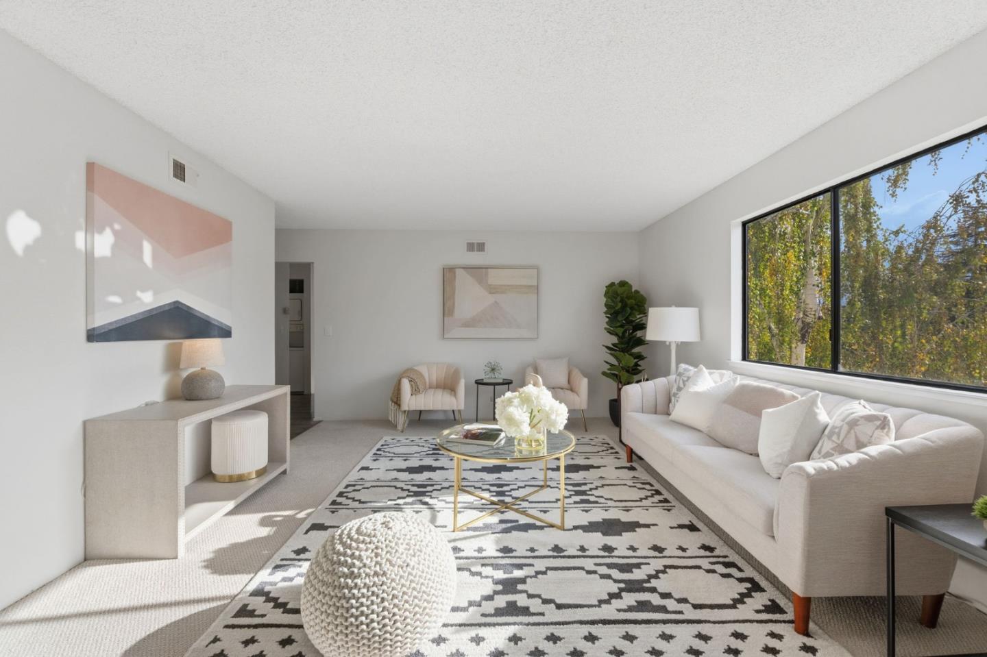 765 San Antonio Road, Unit 88 Palo Alto, CA 94303 - Photo 6 of 41 a living room with furniture wooden floor and a large window