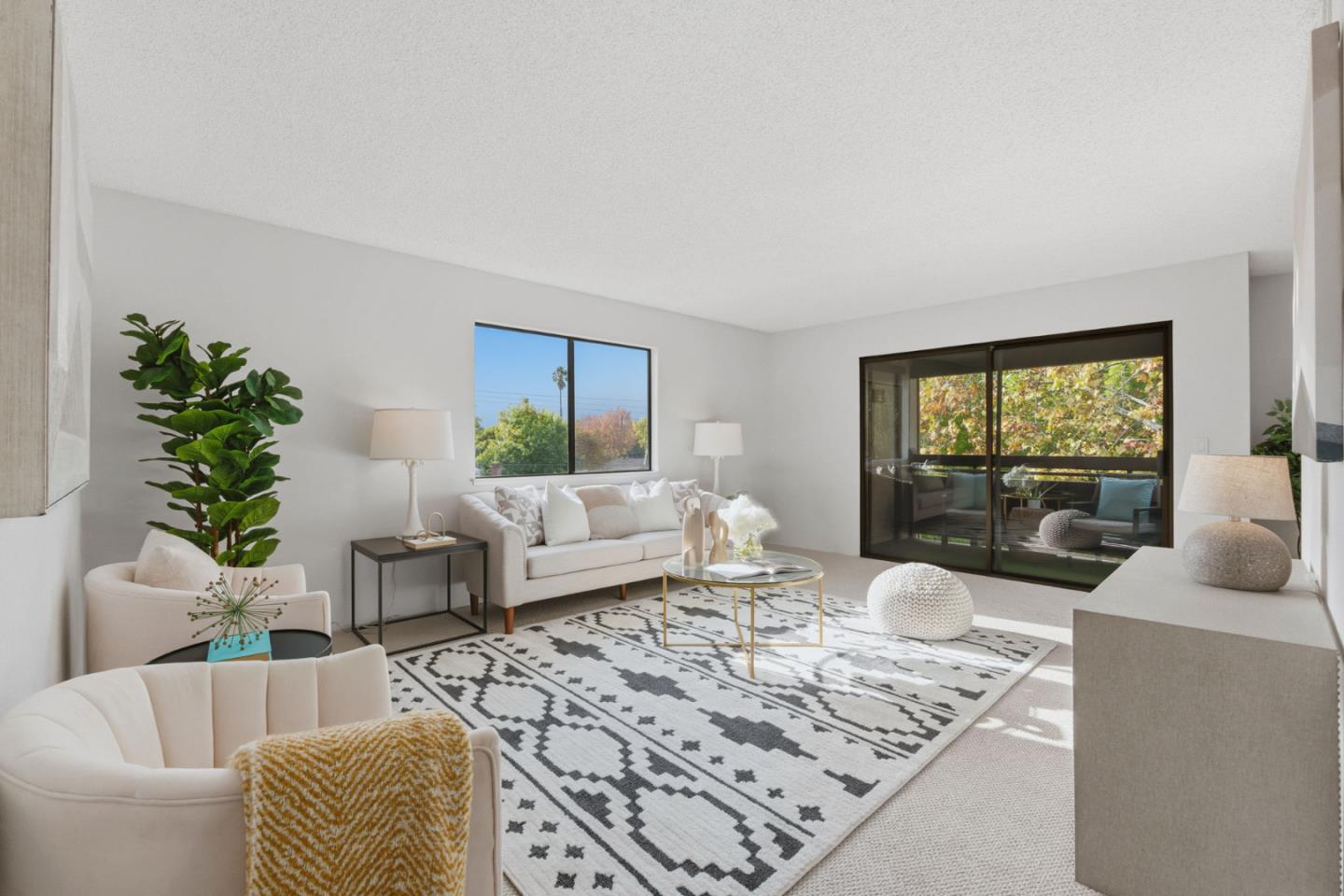 765 San Antonio Road, Unit 88 Palo Alto, CA 94303 - Photo 8 of 41 a living room with furniture and a large window