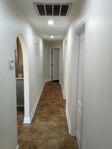 a view of hallway with stairs