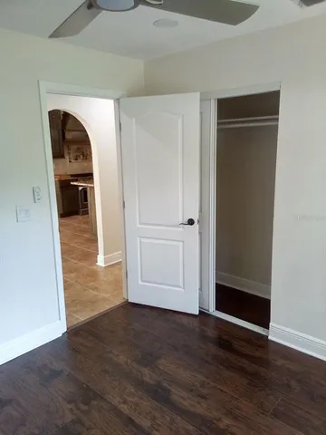 a view of a livingroom with wooden floor