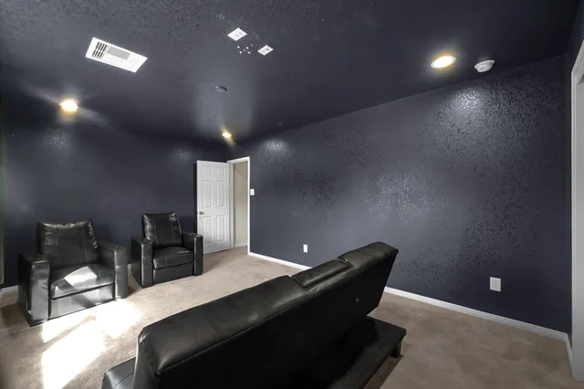 a view of a livingroom with furniture