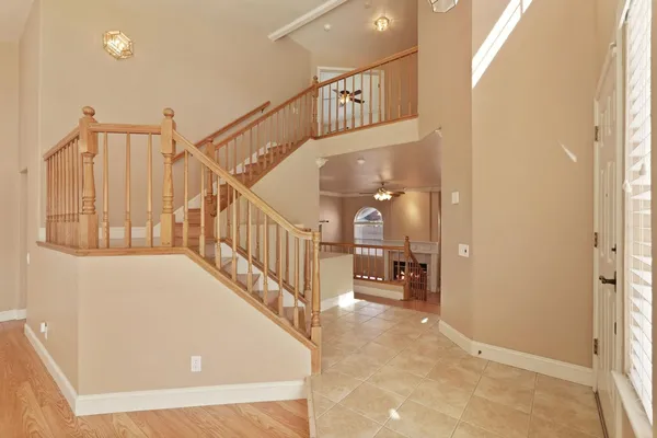 a kitchen with stainless steel appliances granite countertop a stove microwave and refrigerator
