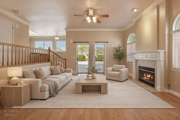 a view of hallway with stairs and wooden floor