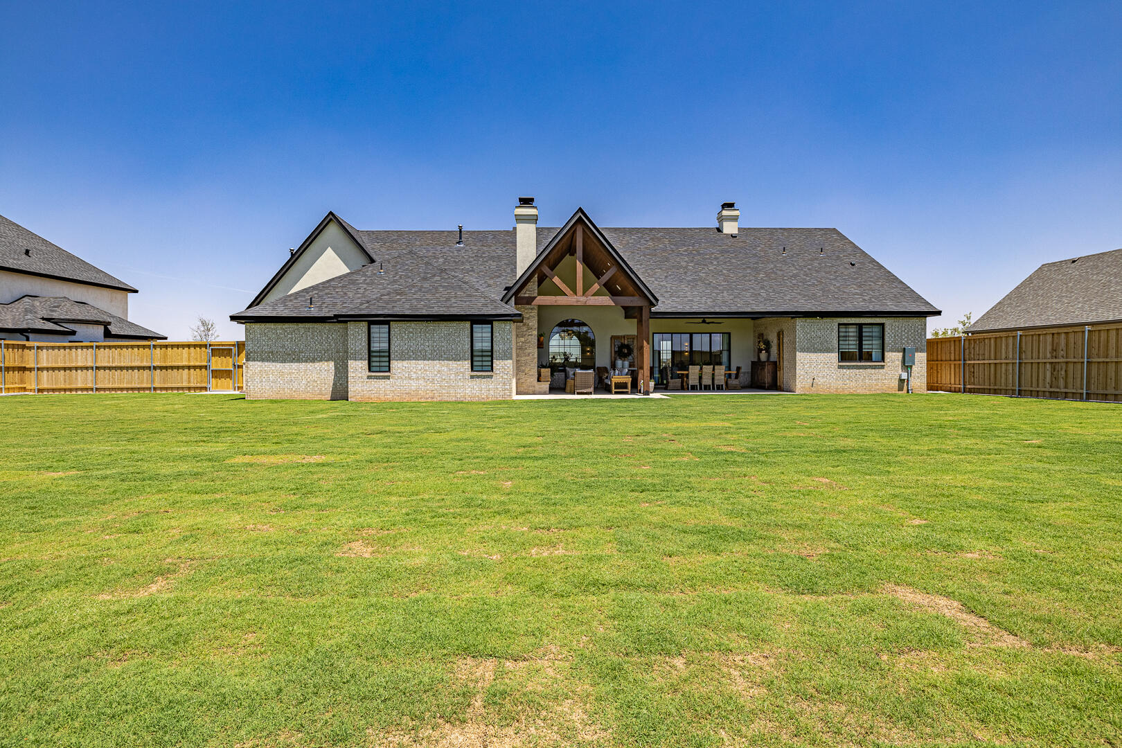 4234 Zadar Avenue Lubbock, TX 79407 - Photo 77 of 84 a front view of a house with a garden
