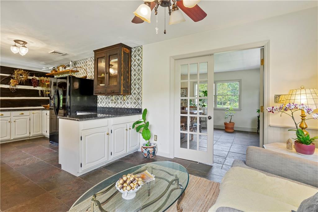 299 Forbes Trail Road Greensburg, PA 15601 - Photo 11 of 42 a living room with furniture and a chandelier