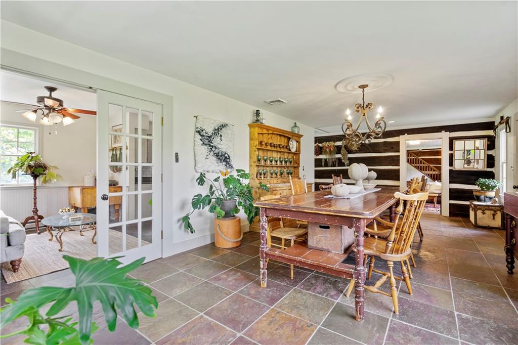 299 Forbes Trail Road Greensburg, PA 15601 - Photo 12 of 42 a view of a dining room with furniture and chandelier