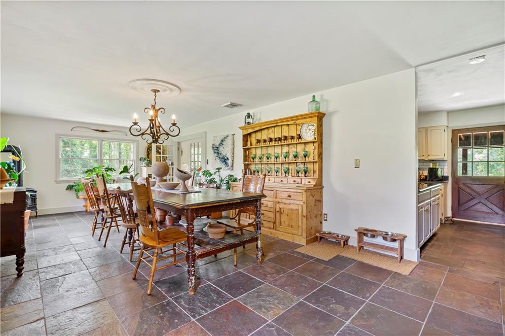 299 Forbes Trail Road Greensburg, PA 15601 - Photo 13 of 42 a view of a dining room with furniture and chandelier