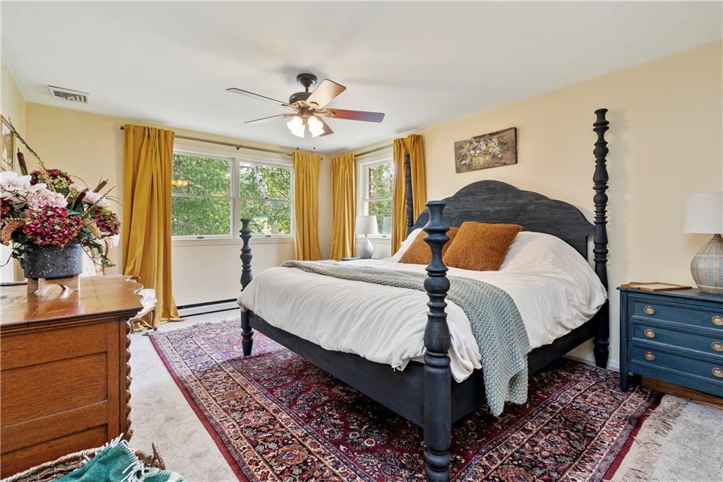 299 Forbes Trail Road Greensburg, PA 15601 - Photo 30 of 42 a bed sitting in a spacious bedroom next to a window