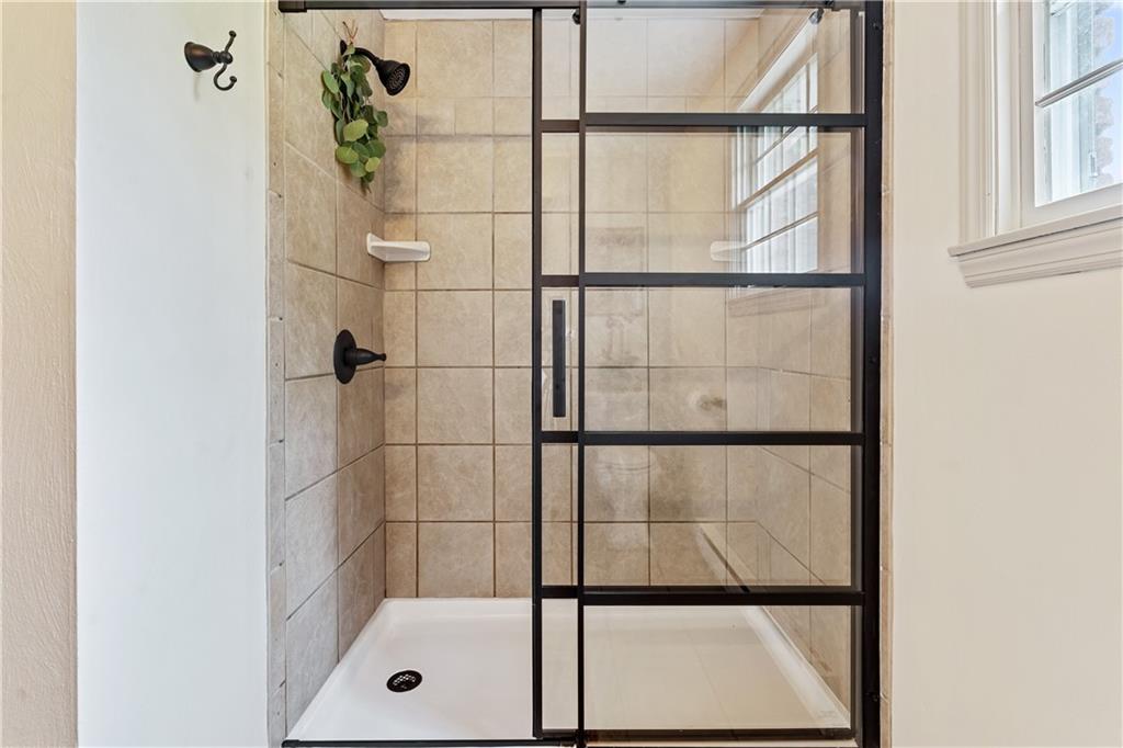 299 Forbes Trail Road Greensburg, PA 15601 - Photo 32 of 42 a bathroom with a glass shower door