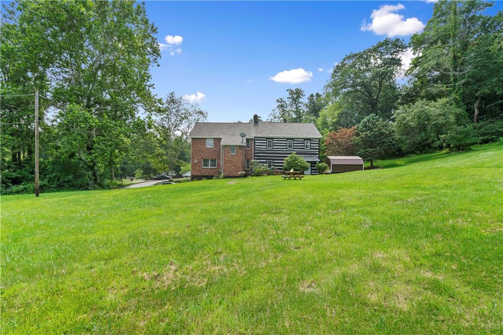 299 Forbes Trail Road Greensburg, PA 15601 - Photo 36 of 42 a view of a house with a yard porch and sitting area