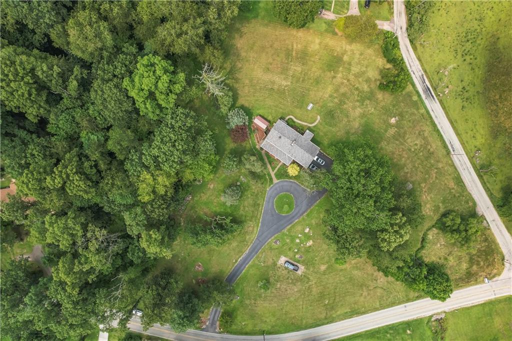299 Forbes Trail Road Greensburg, PA 15601 - Photo 40 of 42 a view of a back yard from a balcony