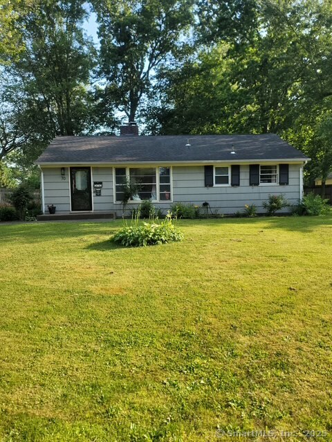 70 Ellsworth Drive Bloomfield, CT 06002 - Photo 1 of 1 a front of a house with a garden