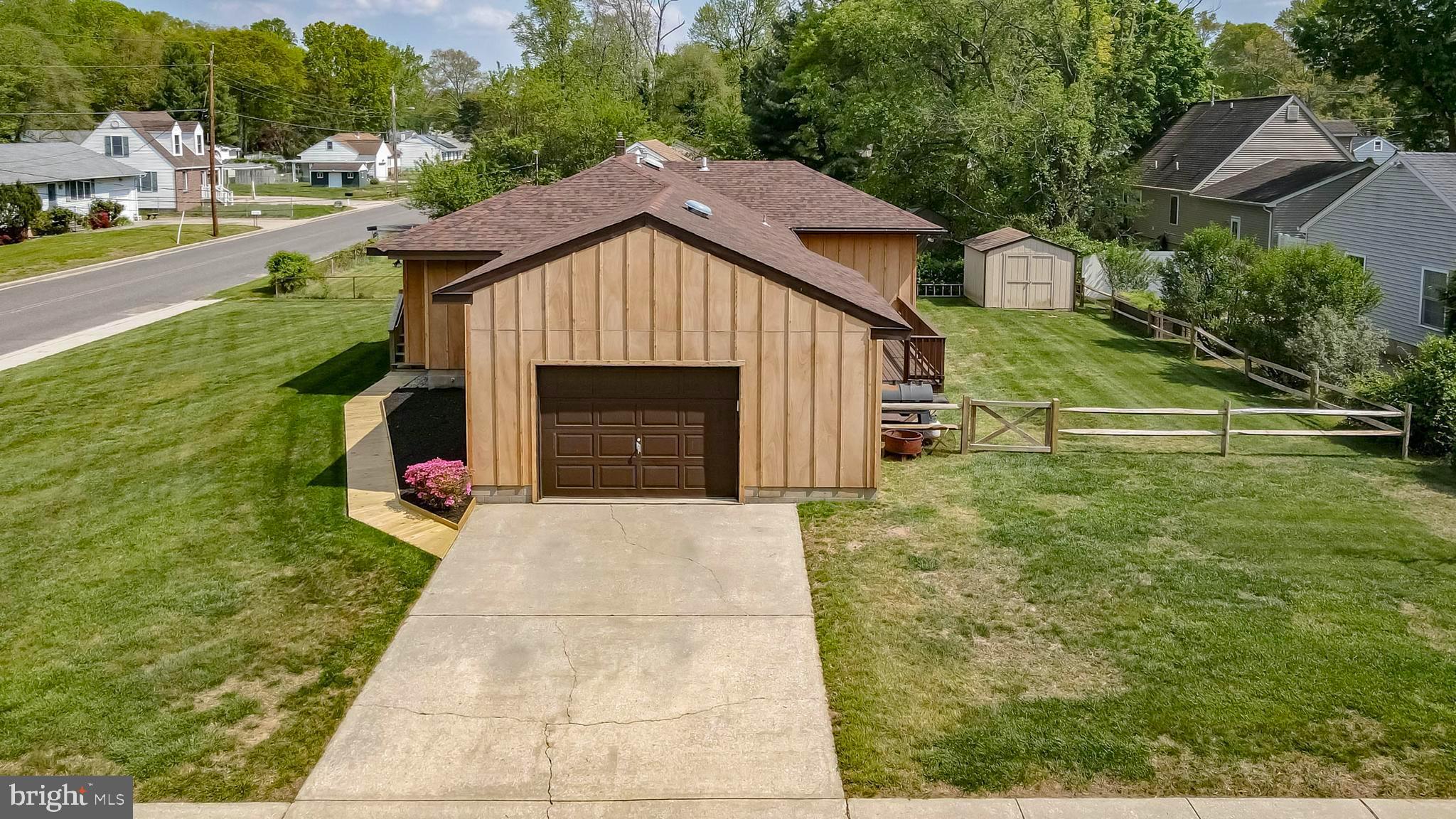 91 Rutgers Road Pennsville, NJ 08070 - Photo 26 of 41 Attached garage and concrete driveway