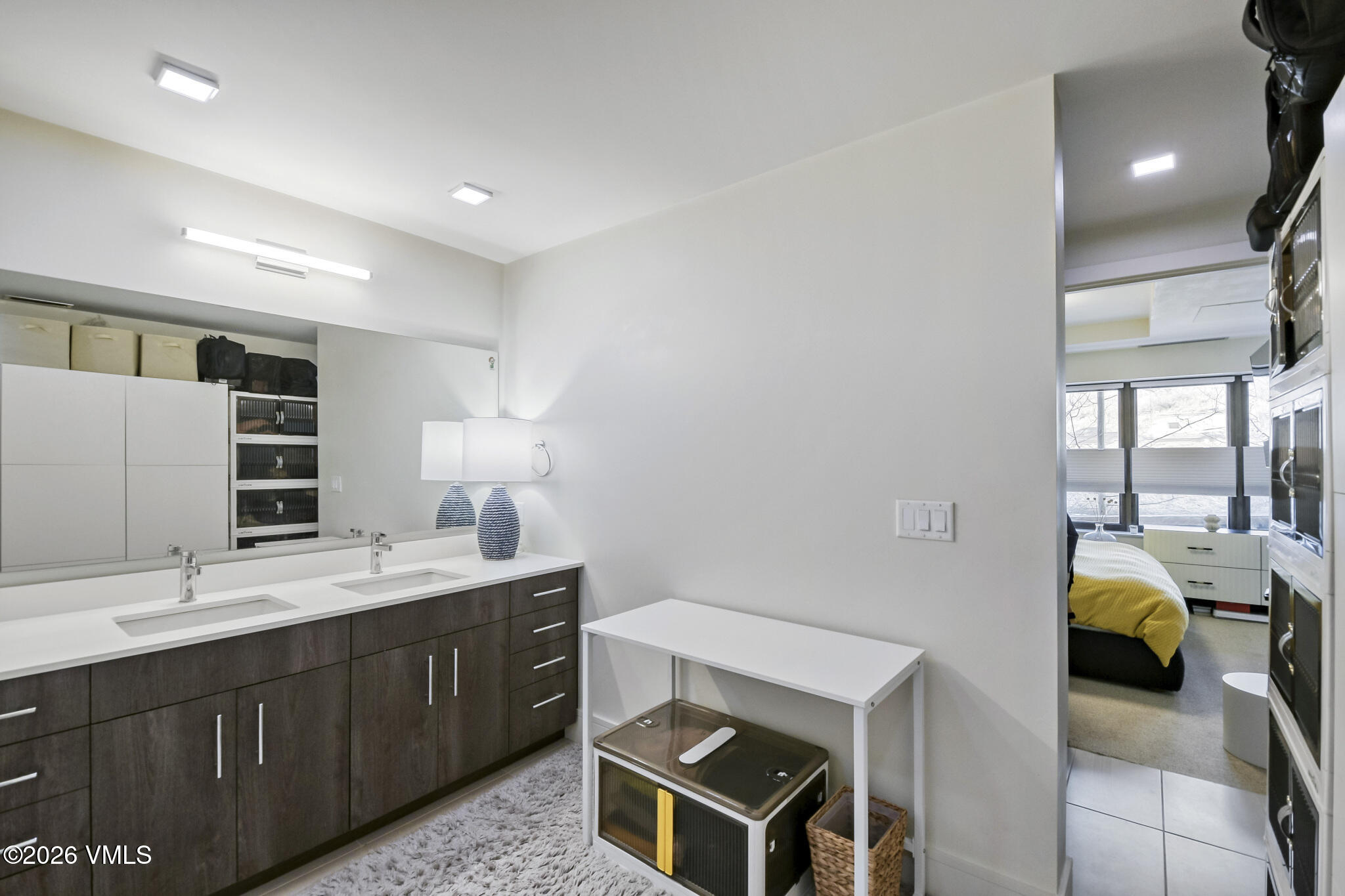 430 South Frontage Road East, Unit RUD Vail, CO 81657 - Photo 11 of 30 a spacious bathroom with a double vanity sink and a window