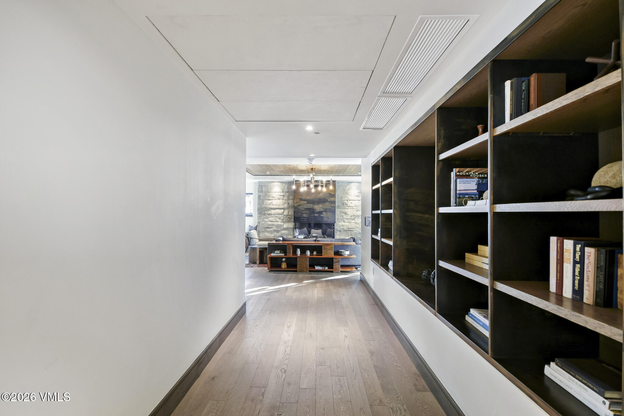 430 South Frontage Road East, Unit RUD Vail, CO 81657 - Photo 17 of 30 a hallway with wine cabinets and furniture