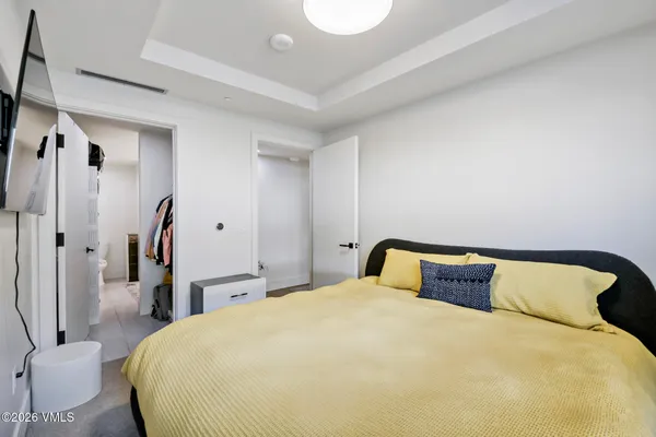 a spacious bathroom with a double vanity sink and a window