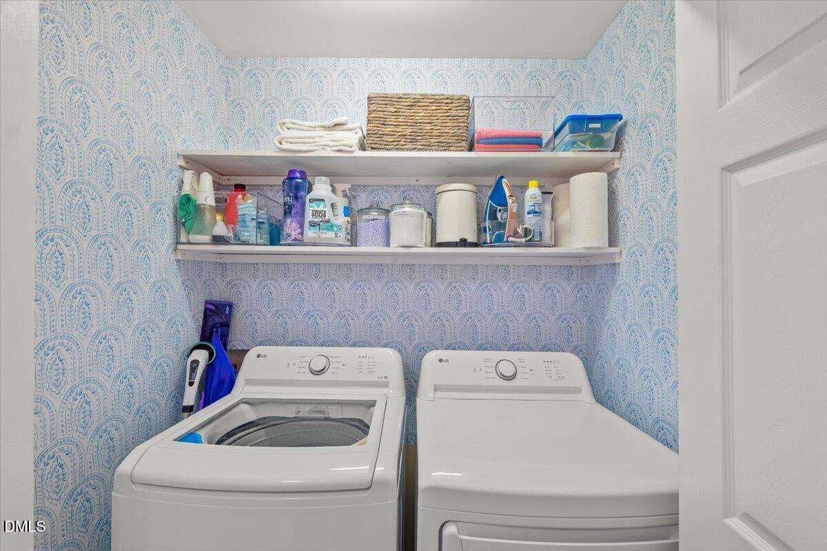 8449 Central Drive Raleigh, NC 27613 - Photo 21 of 38 a utility room with dryer and washer