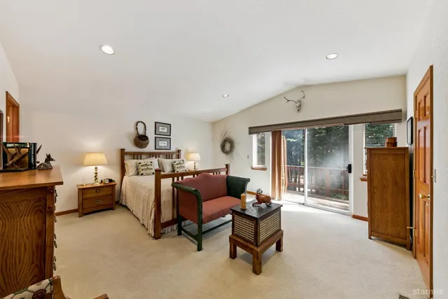 a view of balcony with wooden deck