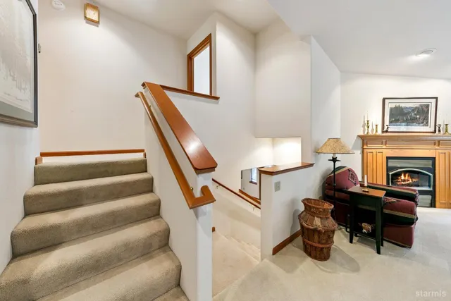 a living room with lots of furniture and couch