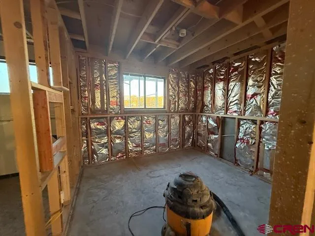 a view of empty room with windows