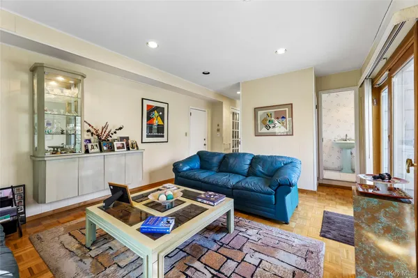 a living room with furniture and a window