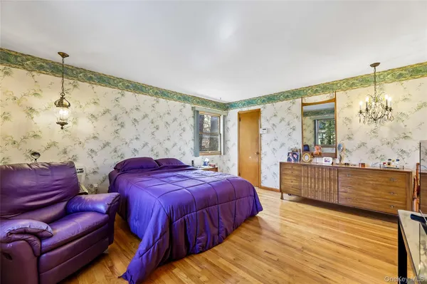 a bed room with a bed and a couch