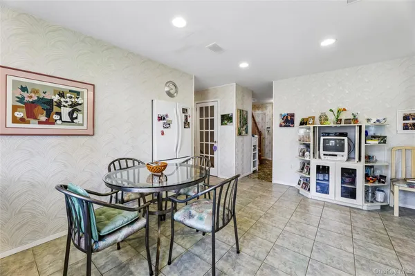 a view of a dining room with furniture
