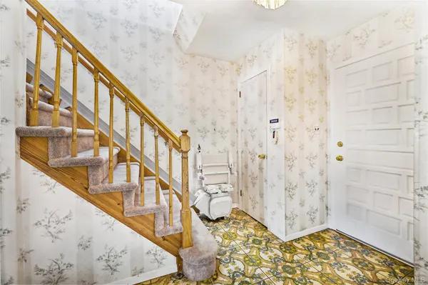a view of an entryway with staircase