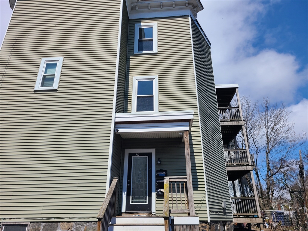 27 Buttonwood Street, Unit 3 Boston, MA 02125 - Photo 2 of 22 a view of a house with a large windows