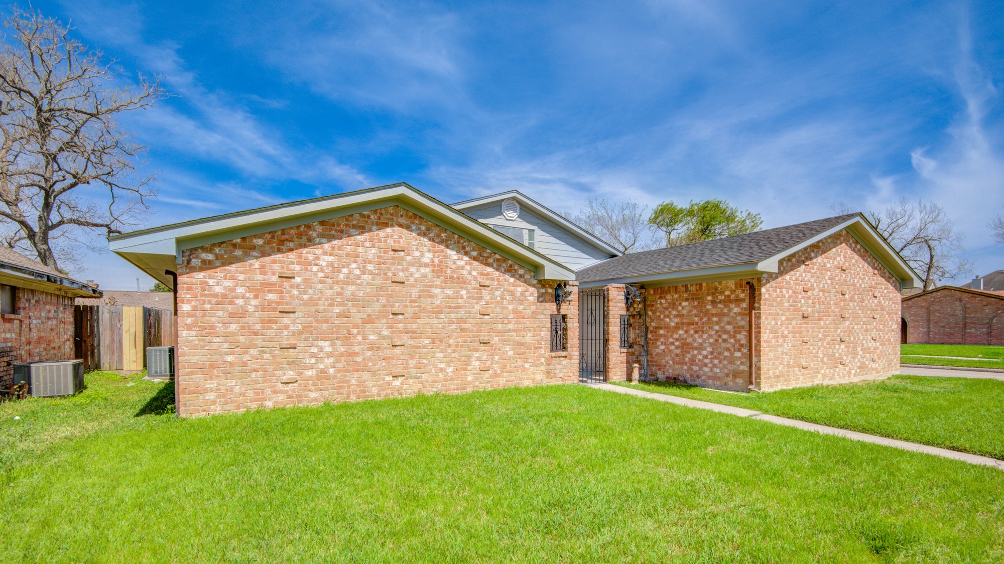 13747 Rampchester Lane Houston, TX 77015 - Photo 1 of 24 a view of a backyard with a garden and plants